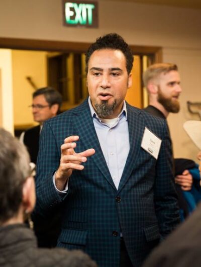 ACLU executive director David Rogers talks to members at meeting