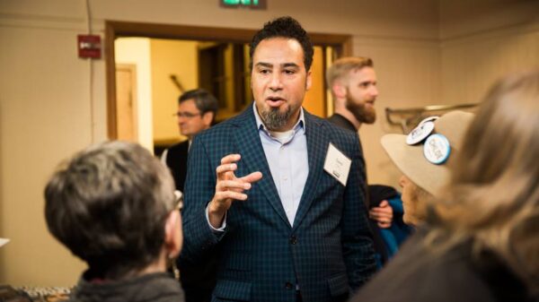 ACLU executive director David Rogers talks to members at meeting