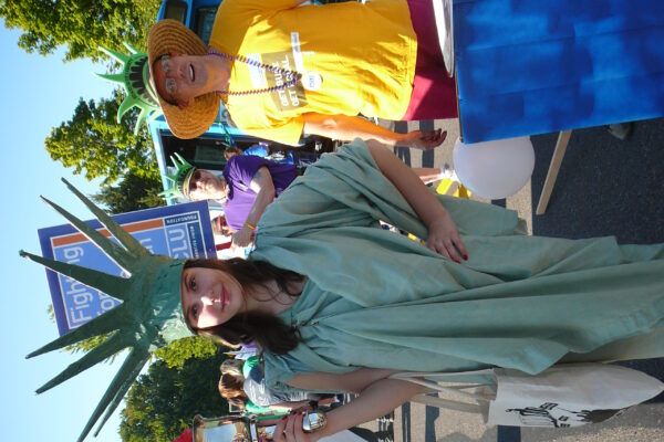 aclu supporter dressed as lady liberty marching