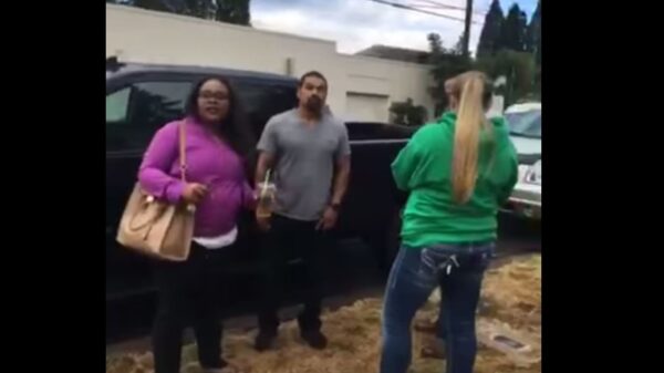 ICE agent in street clothes questions Isidro and his wife