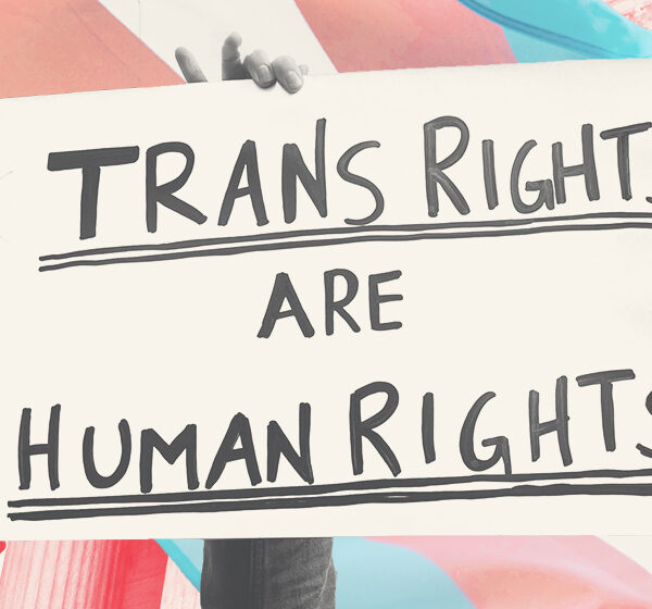 Styled graphic with hand holding sign that says "Trans Rights are Human Rights"