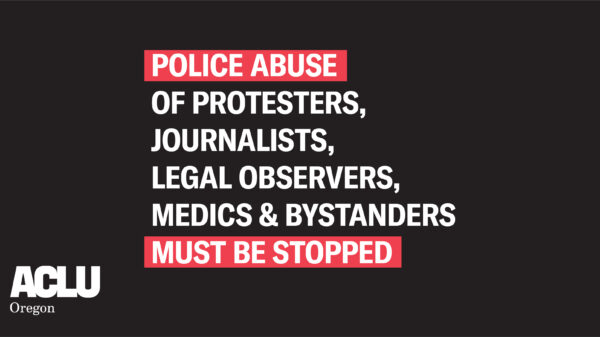 banner that reads, "Police abuse of protesters, journalists, legal observers, medics & bystanders must be stopped."