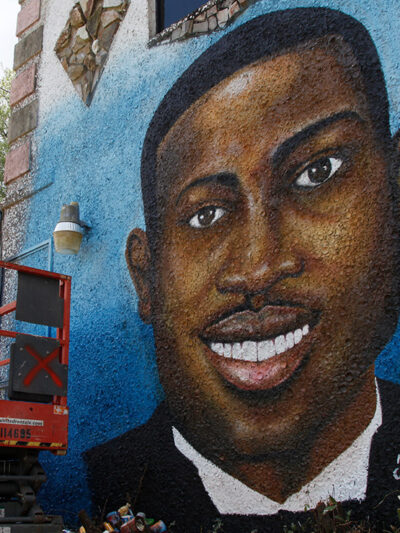 Painted mural of Ahmaud Arbery in Brunswick, Georgia after he was shot and killed in February 2020.