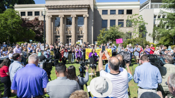 Community members gather outside of Washington County Courthouse to advocate for ICE out of Courts