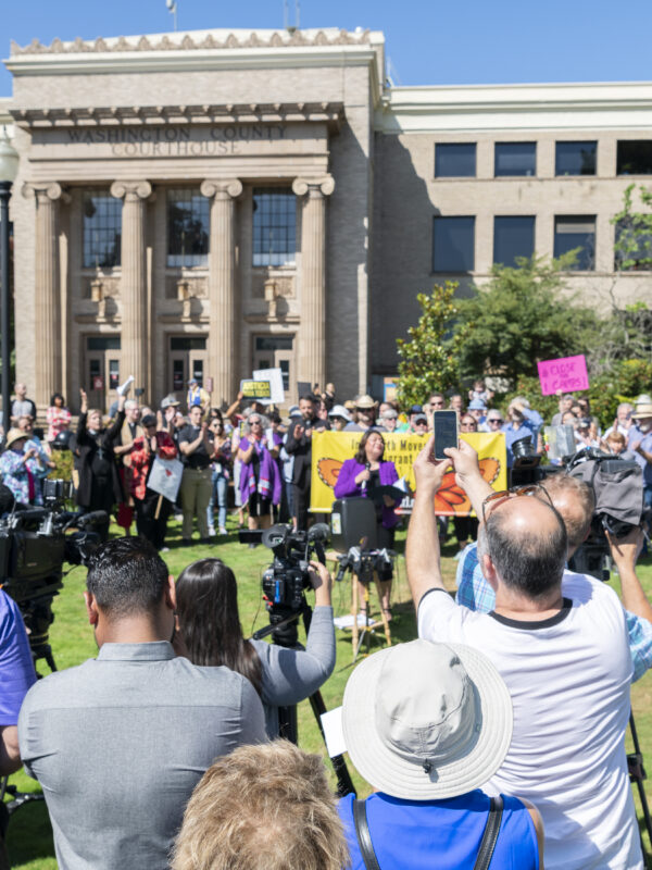 Community members gather outside of Washington County Courthouse to advocate for ICE out of Courts
