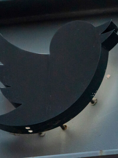 The Twitter logo sign that hangs in front of its New York City headquarters.