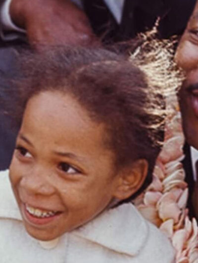 A photo of Sheyann Webb with Dr. Martin Luther King Jr.