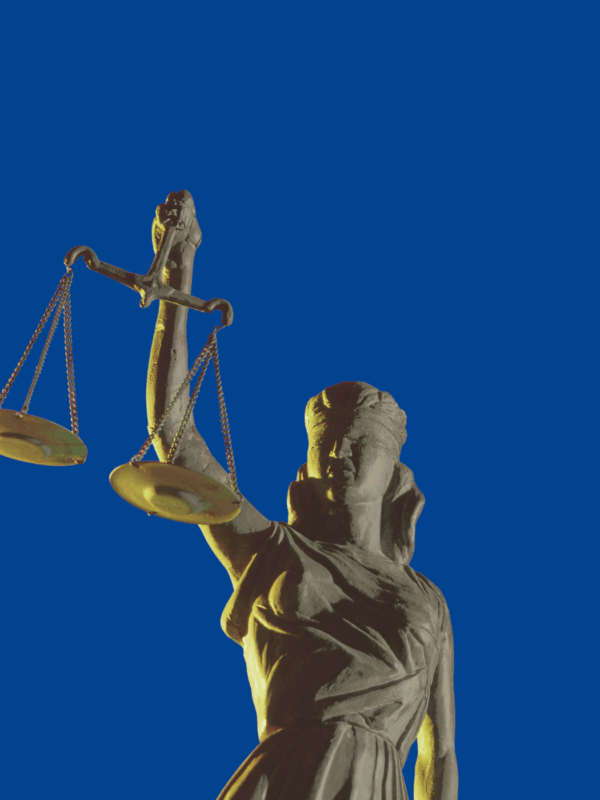 Blue background with an image of the lady of justice statue in the center.