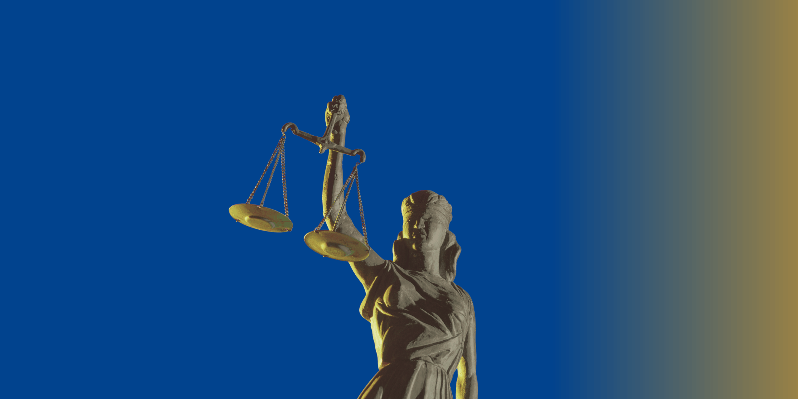 Blue background with an image of the lady of justice statue in the center.