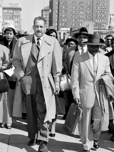 Autherine Lucy, left, front, 26-year-old student at the University of Alabama, arrives at U.S. District Court for the hearing of her petition for an order requiring the school to re-admit her to classes in Birmingham, Ala., Feb. 29, 1956. With Lucy are...