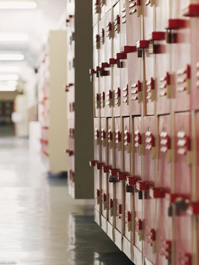 A shot of an empty corridor in a high school.