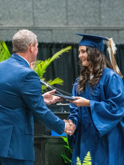 Zuri Wilson receiving her diploma.