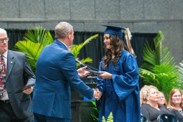 Zuri Wilson receiving her diploma.