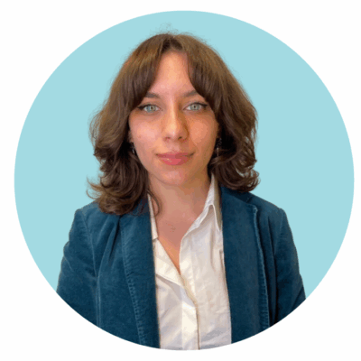 Kennedy Parish in front of a light blue background