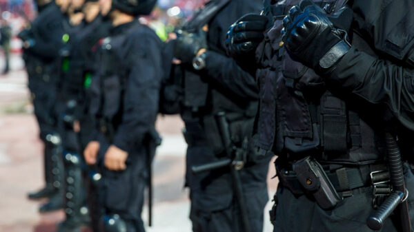 Special police unit at a stadium event.