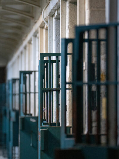 A row of prison doors.
