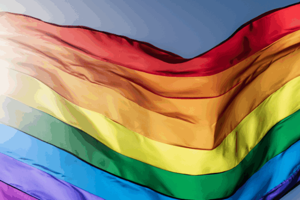 a rippling rainbow flag