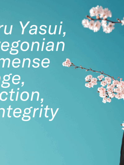 A blue background with cherry blossoms, a black and white portrait of Minoru Yasui, an Oregonian of immense courage, conviction and integrity