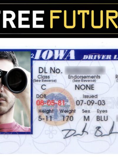 A driver's license in which the photo shows a man peering at the camera through binoculars