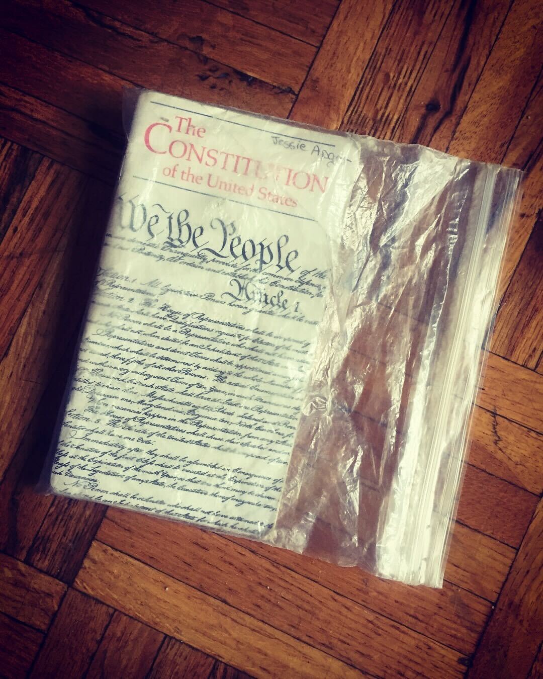 A photo of the pocket constitution that Jessica kept in her helmet.