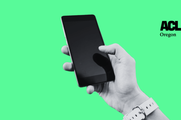 Image with green background and an image of a hand holding a phone
