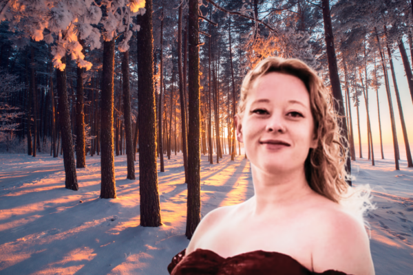 a photo of renee nicole good against a background of snowy trees