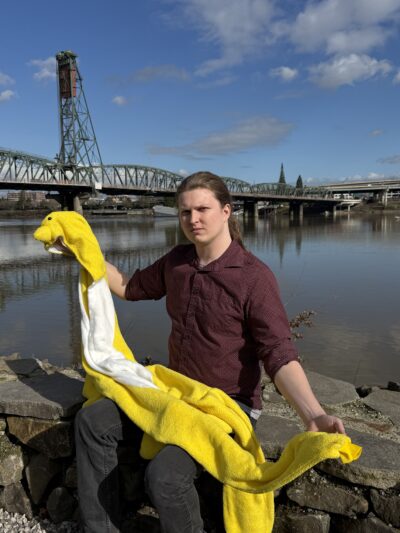 Jack holding his chicken suit