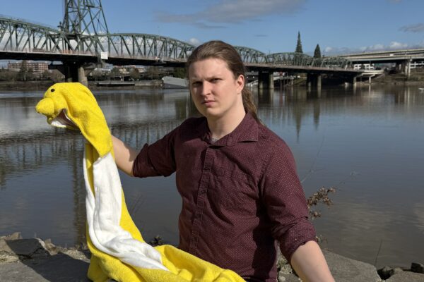 Jack holding his chicken suit