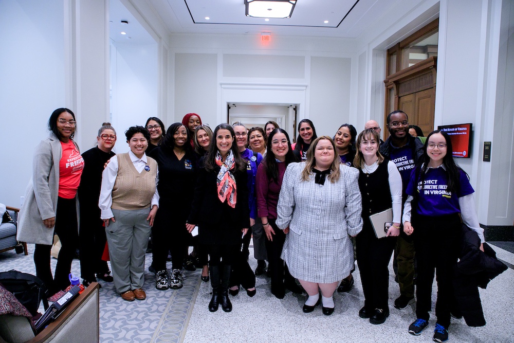 Heather St. Amand (second from left) joins advocates from Virginians for Reproductive Freedom, a coalition of advocates, organizers, community members, and partners, at the 2026 Virginia General Assembly session to support the reproductive freedom constitutional amendment.