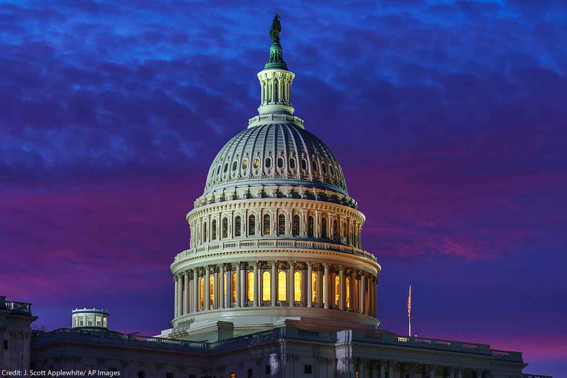 A vividly colored sky behind Capitol Hill in Washington D.C.