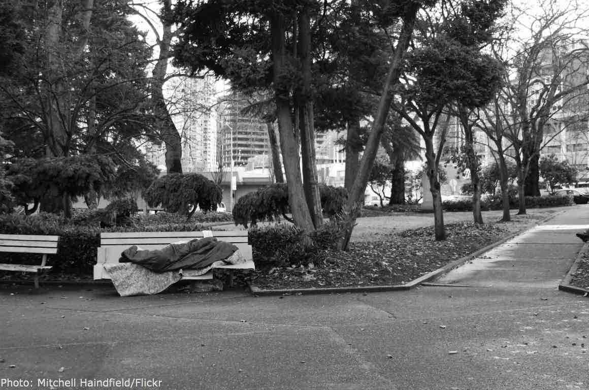 person on bench in a park