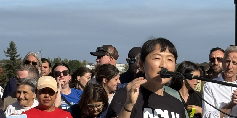 Sandy speaking at rally