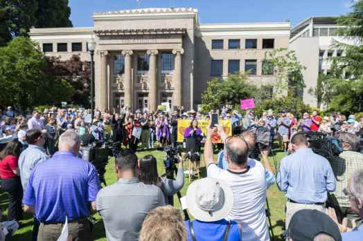 Community members gather outside of Washington County Courthouse to advocate for ICE out of Courts