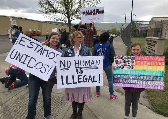 Gorge Ice Resistance protesters holding signs outside of NORCOR