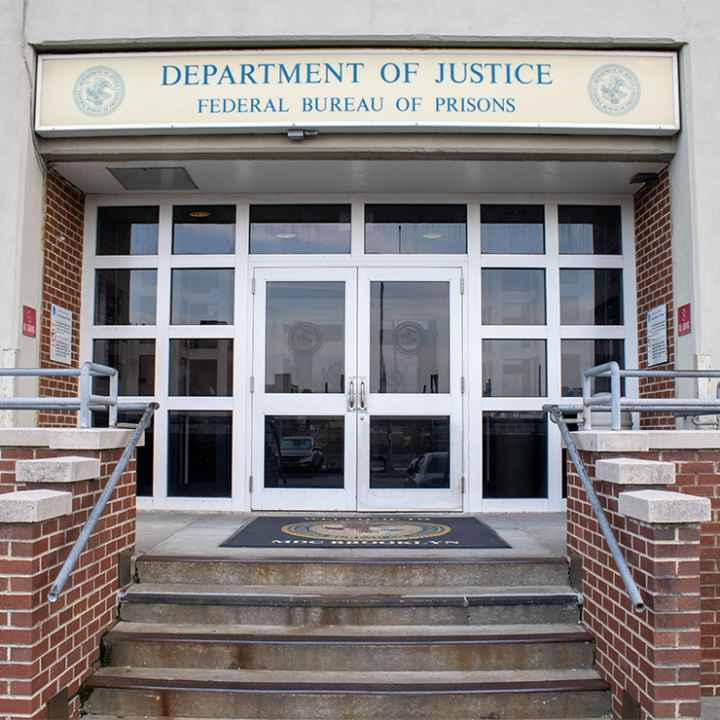 Entrance to the Department of Justice Federal Bureau of Prisons in Brooklyn, NY.