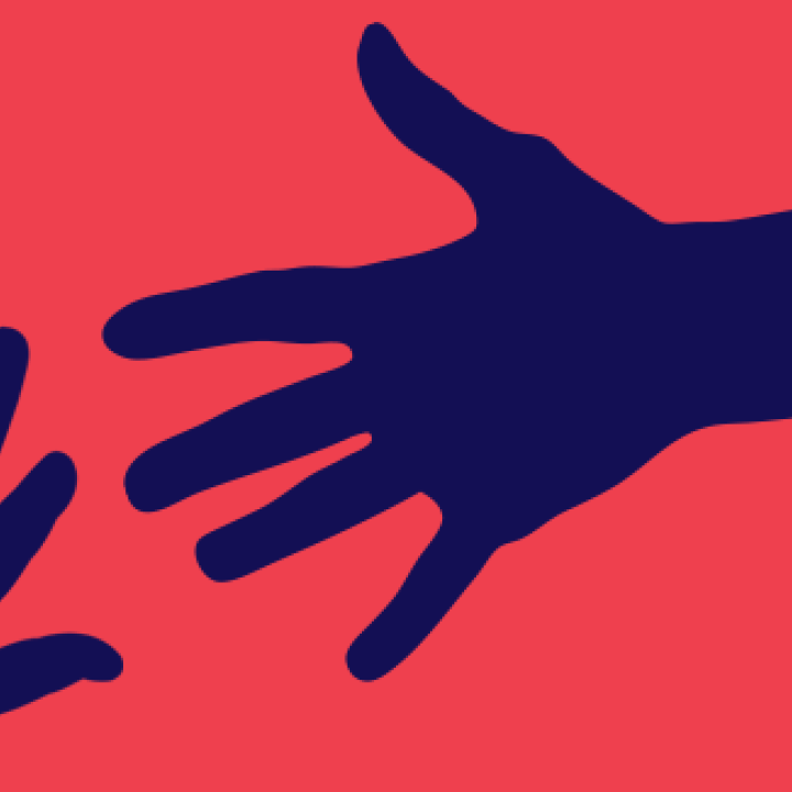 silhouettes of one small hand and one large hand reaching for each other
