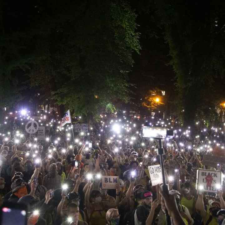 Thousands of protesters gather in downtown Portland in mid-July 2020. The authors write that People for Portland's call for additional police officers ignores the voices of thousands who marched for an end to systemic racism and police brutality. Thousands of protesters gather in downtown Portland in mid-July 2020. The authors write that People for Portland's call for additional police officers ignores the voices of thousands who marched for an end to systemic racism and police brutality.