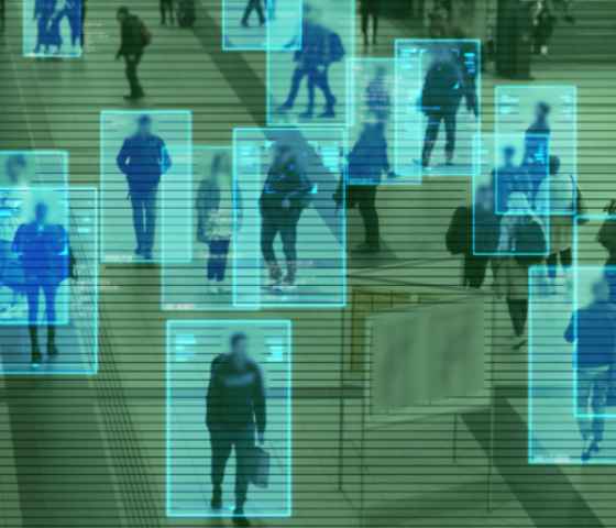Scanning the crowd of people walking at the railway station. Surveillance interface using artificial intelligence and facial recognition.